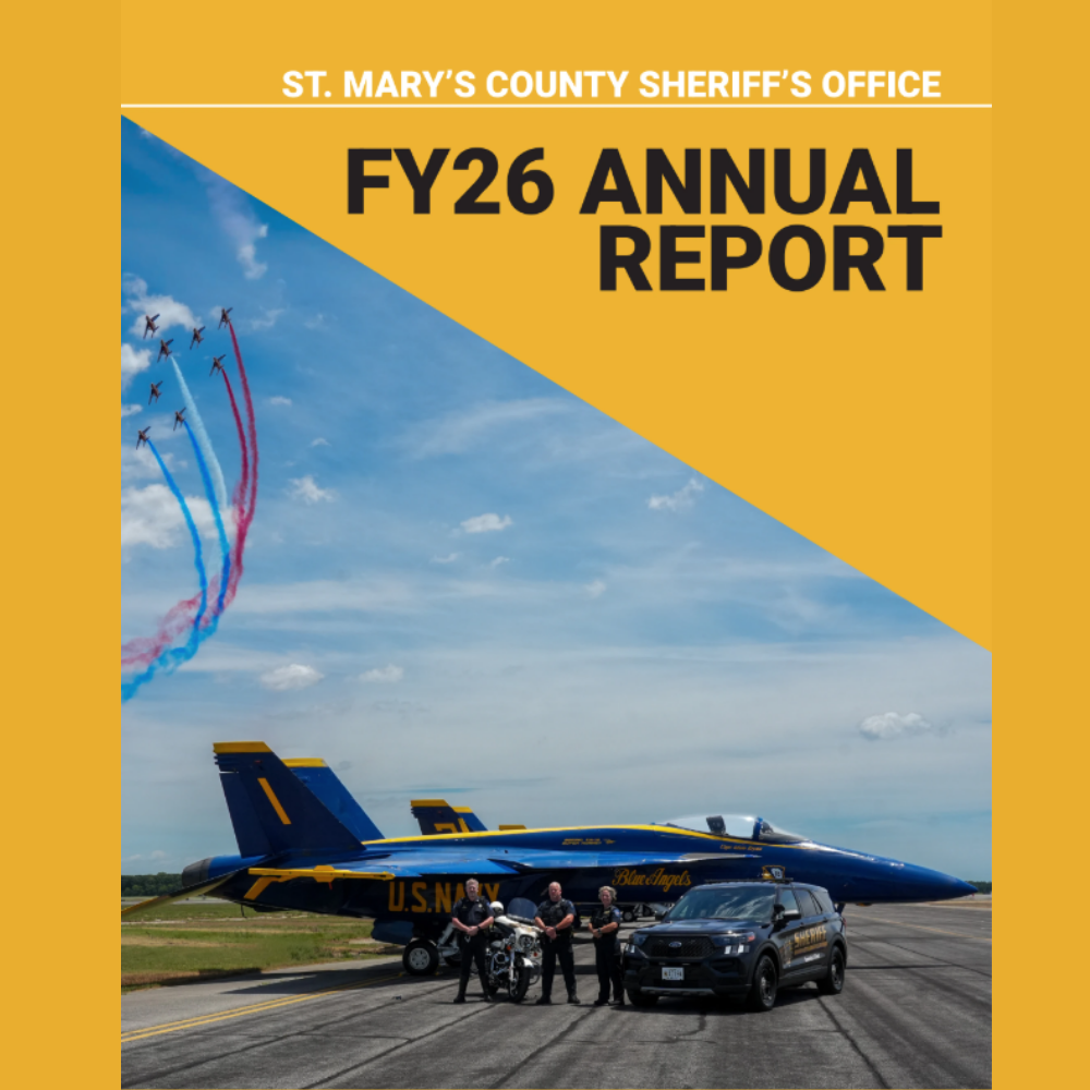 Image of an F-18 Airplane with police cars and three deputies and the words F Y 2026 Annual Report