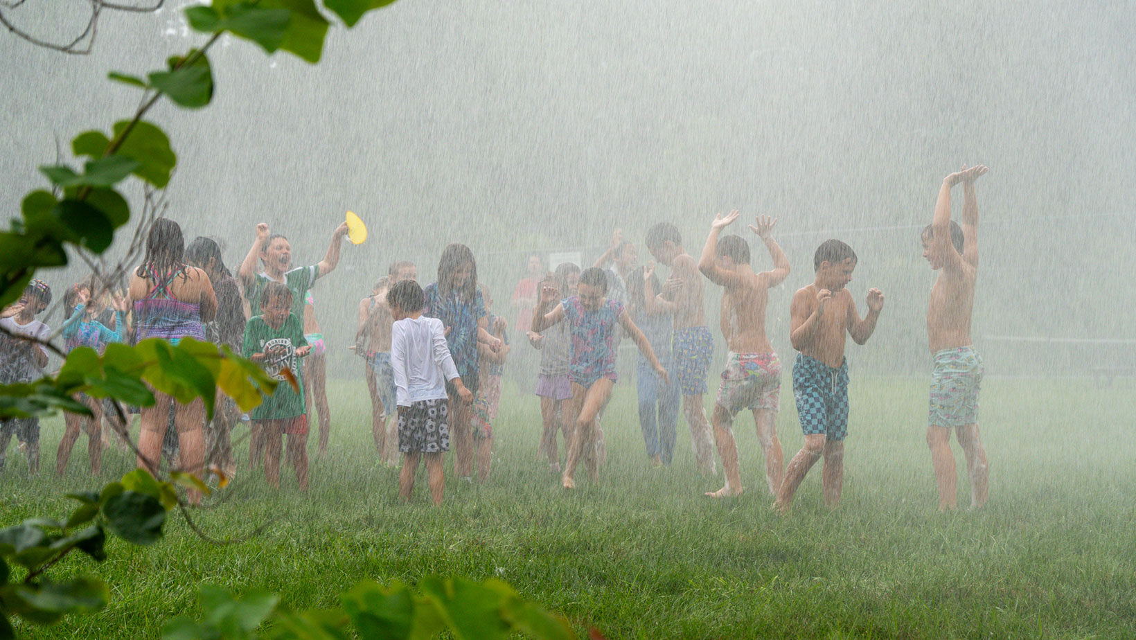 A group of Children having fun in the rain