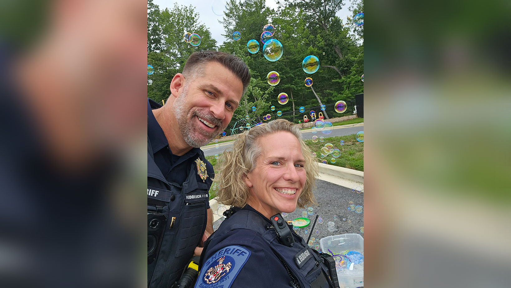Officers with bubbles in the background